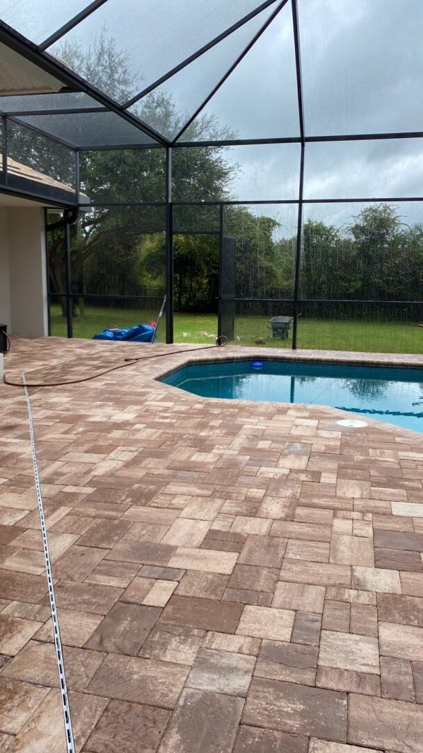 Pool areas and decorative pavers on the pool decks